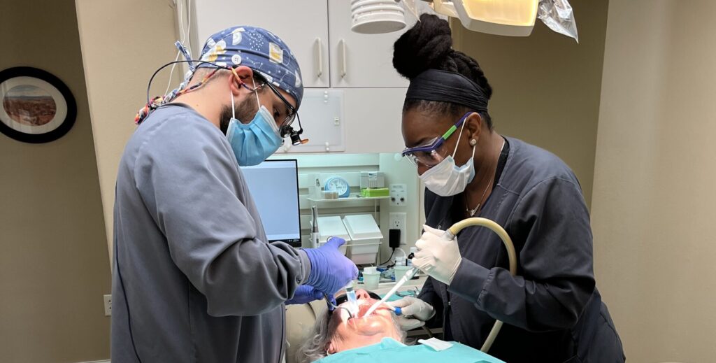 Dr Marquez and Collete Dental Assistant working (1)